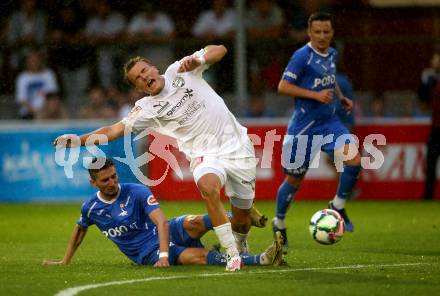 Fussball. OEFB Cup. SAK gegen Wiener Sport-Club. Hrvoje Jakovljevic, (SAK),   Philip Buzuk  (Wiener Sport-Club). Klagenfurt, 15.7.2022.
Foto: Kuess
---
pressefotos, pressefotografie, kuess, qs, qspictures, sport, bild, bilder, bilddatenbank