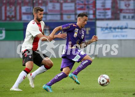 Fussball Testspiel. SK Austria Klagenfurt gegen FC Southampton.   Sinan Karweina (Klagenfurt),  Jack Stephens  (FC Southampton). Klagenfurt, am 18.7.2022. 
Foto: Kuess

---
pressefotos, pressefotografie, kuess, qs, qspictures, sport, bild, bilder, bilddatenbank