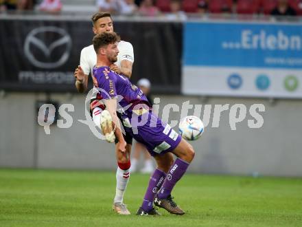 Fussball Testspiel. SK Austria Klagenfurt gegen FC Southampton.   Patrick Hasenhuettl (Klagenfurt),   Jan Bednarek (FC Southampton). Klagenfurt, am 18.7.2022. 
Foto: Kuess

---
pressefotos, pressefotografie, kuess, qs, qspictures, sport, bild, bilder, bilddatenbank