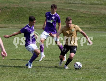 Fussball. Kaerntner Liga. Austria Klagenfurt Amat. gegen Koettmannsdorf.   Chris-Stephan Dierke (Austria Klagenfurt Amat),  Ziga Erzen  (Koettmannsdorf). Brueckl, 23.7.2022.
Foto: Kuess
---
pressefotos, pressefotografie, kuess, qs, qspictures, sport, bild, bilder, bilddatenbank