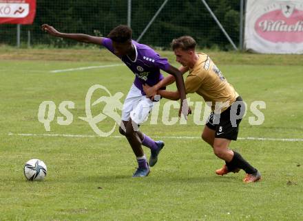 Fussball. Kaerntner Liga. Austria Klagenfurt Amat. gegen Koettmannsdorf.   Mersei Dieu Nsandi (Austria Klagenfurt Amat),  Nico Daniel Taschwer  (Koettmannsdorf). Brueckl, 23.7.2022.
Foto: Kuess
---
pressefotos, pressefotografie, kuess, qs, qspictures, sport, bild, bilder, bilddatenbank