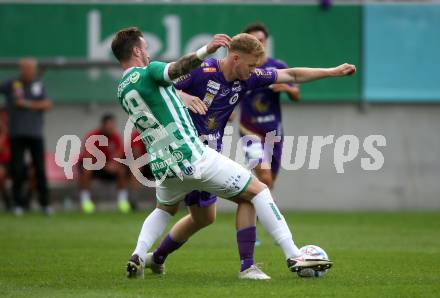 Fussball. Bundesliga. Austria Klagenfurt gegen Rapid Wien. Jonas Arweiler (Klagenfurt),  Michael Sollbauer (Rapid).  Klagenfurt, 31.7.2022.
Foto: Kuess
---
pressefotos, pressefotografie, kuess, qs, qspictures, sport, bild, bilder, bilddatenbank