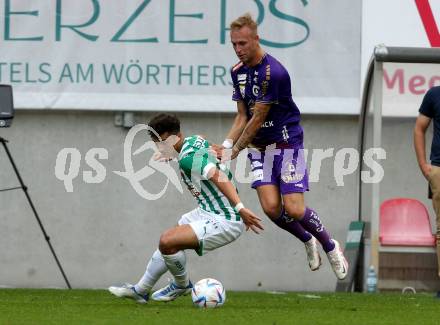 Fussball. Bundesliga. Austria Klagenfurt gegen Rapid Wien. Florian Jaritz,  (Klagenfurt),   Bernhard Zimmermann (Rapid).  Klagenfurt, 31.7.2022.
Foto: Kuess
---
pressefotos, pressefotografie, kuess, qs, qspictures, sport, bild, bilder, bilddatenbank