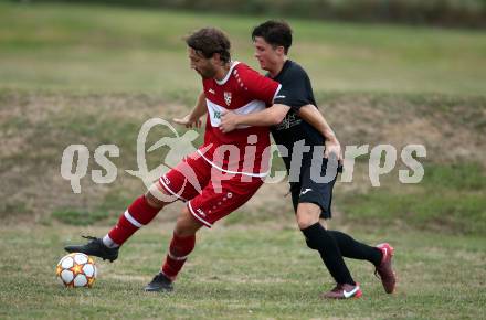 Fussball 2. Klasse C. St. Margarethen im Lavanttal gegen St. Paul.  Florian Maier  (St.Margarethen),   Daniel Felix Perlinger (St. Paul).  St. Matgarethen, am 6.8.2022.
Foto: Kuess
---
pressefotos, pressefotografie, kuess, qs, qspictures, sport, bild, bilder, bilddatenbank