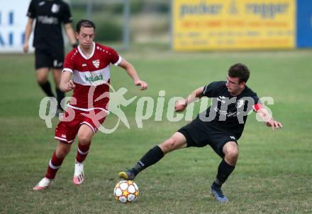 Fussball 2. Klasse C. St. Margarethen im Lavanttal gegen St. Paul.  Lukas Stefan Friesacher  (St.Margarethen),   Jan Razgorsek (St. Paul).  St. Matgarethen, am 6.8.2022.
Foto: Kuess
---
pressefotos, pressefotografie, kuess, qs, qspictures, sport, bild, bilder, bilddatenbank