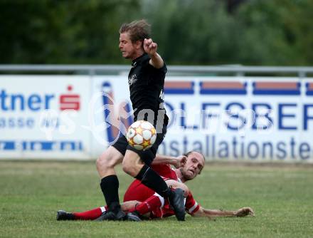 Fussball 2. Klasse C. St. Margarethen im Lavanttal gegen St. Paul.  Herbert Matthias Theuermann  (St.Margarethen),   Marcel Hartl  (St. Paul).  St. Matgarethen, am 6.8.2022.
Foto: Kuess
---
pressefotos, pressefotografie, kuess, qs, qspictures, sport, bild, bilder, bilddatenbank