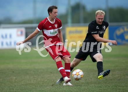 Fussball 2. Klasse C. St. Margarethen im Lavanttal gegen St. Paul.  Jakob Peter Schmeisser (St.Margarethen),   Jan Razgorsek (St. Paul).  St. Matgarethen, am 6.8.2022.
Foto: Kuess
---
pressefotos, pressefotografie, kuess, qs, qspictures, sport, bild, bilder, bilddatenbank