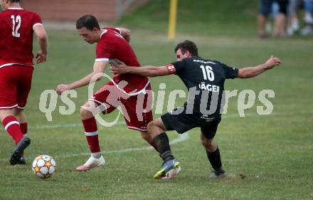 Fussball 2. Klasse C. St. Margarethen im Lavanttal gegen St. Paul. Lukas Stefan Friesacher   (St.Margarethen),  Jan Razgorsek  (St. Paul).  St. Matgarethen, am 6.8.2022.
Foto: Kuess
---
pressefotos, pressefotografie, kuess, qs, qspictures, sport, bild, bilder, bilddatenbank