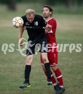 Fussball 2. Klasse C. St. Margarethen im Lavanttal gegen St. Paul.  Martin Mayerhofer (St.Margarethen),  Jan Razgorsek  (St. Paul).  St. Matgarethen, am 6.8.2022.
Foto: Kuess
---
pressefotos, pressefotografie, kuess, qs, qspictures, sport, bild, bilder, bilddatenbank