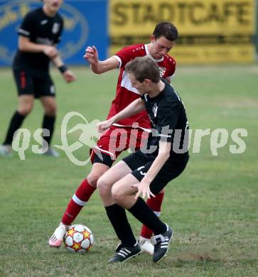 Fussball 2. Klasse C. St. Margarethen im Lavanttal gegen St. Paul. Marcel Dietmar Trettenbrein  (St.Margarethen),   Jan Razgorsek (St. Paul).  St. Matgarethen, am 6.8.2022.
Foto: Kuess
---
pressefotos, pressefotografie, kuess, qs, qspictures, sport, bild, bilder, bilddatenbank
