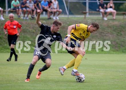 Fussball 1. KLasse. DSG Ferlach gegen St. Margareten im Rosental.    Michael Krainer (Ferlach),  Paul Matthias Wedenig  (St. Margareten). Ferlach, am 23.7.2022.
Foto: Kuess
---
pressefotos, pressefotografie, kuess, qs, qspictures, sport, bild, bilder, bilddatenbank