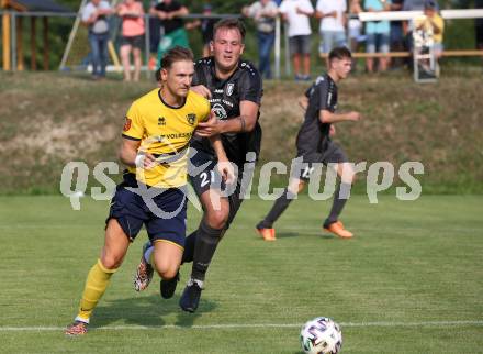 Fussball 1. KLasse. DSG Ferlach gegen St. Margareten im Rosental.    Michael Krainer (Ferlach),  Philipp Karl Mocnik  (St. Margareten). Ferlach, am 23.7.2022.
Foto: Kuess
---
pressefotos, pressefotografie, kuess, qs, qspictures, sport, bild, bilder, bilddatenbank
