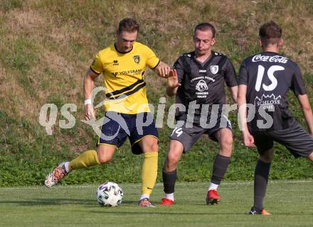 Fussball 1. KLasse. DSG Ferlach gegen St. Margareten im Rosental.    Michael Krainer (Ferlach),   Cenric Leon Krassnig (St. Margareten). Ferlach, am 23.7.2022.
Foto: Kuess
---
pressefotos, pressefotografie, kuess, qs, qspictures, sport, bild, bilder, bilddatenbank