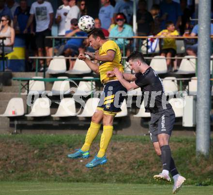 Fussball 1. KLasse. DSG Ferlach gegen St. Margareten im Rosental.    Rok Elsner (Ferlach),  Izudin Mujic  (St. Margareten). Ferlach, am 23.7.2022.
Foto: Kuess
---
pressefotos, pressefotografie, kuess, qs, qspictures, sport, bild, bilder, bilddatenbank