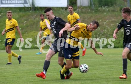 Fussball 1. KLasse. DSG Ferlach gegen St. Margareten im Rosental.    Maximilian Nikolaus Melbinger (Ferlach), Stefan Nikolic   (St. Margareten). Ferlach, am 23.7.2022.
Foto: Kuess
---
pressefotos, pressefotografie, kuess, qs, qspictures, sport, bild, bilder, bilddatenbank