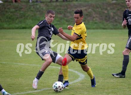 Fussball 1. KLasse. DSG Ferlach gegen St. Margareten im Rosental.    Marcel Schmautz (Ferlach),   Kenen Bosnic (St. Margareten). Ferlach, am 23.7.2022.
Foto: Kuess
---
pressefotos, pressefotografie, kuess, qs, qspictures, sport, bild, bilder, bilddatenbank