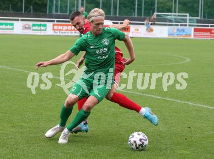 Fussball Kaerntner Liga. Landskron gegen ATSV Wolfsberg.  Philipp Alexander Gabriel Clementschitsch  (Landskron),   Denis Besirevic (Wolfsberg).  Landskron,  20.8.2022.
Foto: Kuess
---
pressefotos, pressefotografie, kuess, qs, qspictures, sport, bild, bilder, bilddatenbank