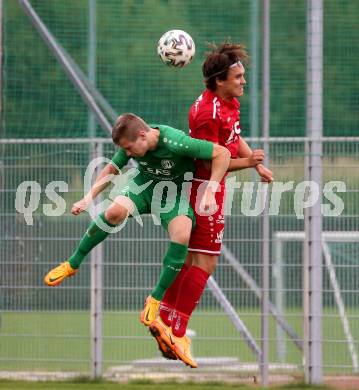 Fussball Kaerntner Liga. Landskron gegen ATSV Wolfsberg.  Markus Ulbing  (Landskron),    Alexander Kainz (Wolfsberg).  Landskron,  20.8.2022.
Foto: Kuess
---
pressefotos, pressefotografie, kuess, qs, qspictures, sport, bild, bilder, bilddatenbank