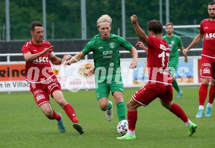 Fussball Kaerntner Liga. Landskron gegen ATSV Wolfsberg.   Philipp Alexander Gabriel Clementschitsch (Landskron),  Patrick Pfennich, Maximilian Sorger  (Wolfsberg).  Landskron,  20.8.2022.
Foto: Kuess
---
pressefotos, pressefotografie, kuess, qs, qspictures, sport, bild, bilder, bilddatenbank