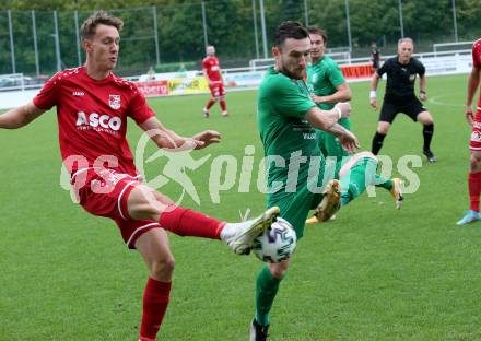 Fussball Kaerntner Liga. Landskron gegen ATSV Wolfsberg.   Julian Brandstaetter  (Landskron),    Fabian Rothleitner (Wolfsberg).  Landskron,  20.8.2022.
Foto: Kuess
---
pressefotos, pressefotografie, kuess, qs, qspictures, sport, bild, bilder, bilddatenbank