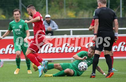 Fussball Kaerntner Liga. Landskron gegen ATSV Wolfsberg.  Nemanja Lukic  (Landskron),    Denis Besirevic (Wolfsberg).  Landskron,  20.8.2022.
Foto: Kuess
---
pressefotos, pressefotografie, kuess, qs, qspictures, sport, bild, bilder, bilddatenbank