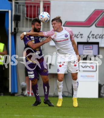 Fussball Bundesliga.  SK Austria Klagenfurt gegen FK Austria Wien.  Kosmas Gkezos,   (Klagenfurt),   Romeo Vucic (Wien). Klagenfurt, am 28.8.2022. 
Foto: Kuess

---
pressefotos, pressefotografie, kuess, qs, qspictures, sport, bild, bilder, bilddatenbank
