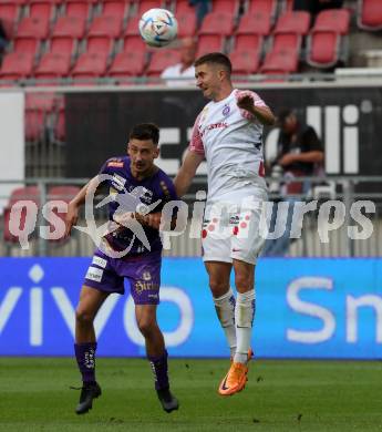 Fussball Bundesliga.  SK Austria Klagenfurt gegen FK Austria Wien.  Till SEbastian Schumacher, (Klagenfurt),   Reinhold Ranftl   (Wien). Klagenfurt, am 28.8.2022. 
Foto: Kuess

---
pressefotos, pressefotografie, kuess, qs, qspictures, sport, bild, bilder, bilddatenbank