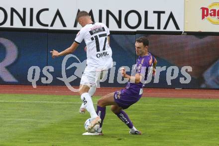 Fussball Bundesliga.  WAC gegen SK Austria Klagenfurt.  Ervin Omic,   (WAC),  Andrew Irving  (Klagenfurt). Wolfsberg, am 4.9..2022. 
Foto: Kuess

---
pressefotos, pressefotografie, kuess, qs, qspictures, sport, bild, bilder, bilddatenbank