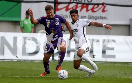 Fussball Bundesliga.  SK Austria Klagenfurt gegen SK Puntigamer Sturm Graz.  Christopher Wernitznig,    (Klagenfurt), Manprit Sarkaria  (Graz). Klagenfurt, am 11.9..2022. 
Foto: Kuess

---
pressefotos, pressefotografie, kuess, qs, qspictures, sport, bild, bilder, bilddatenbank