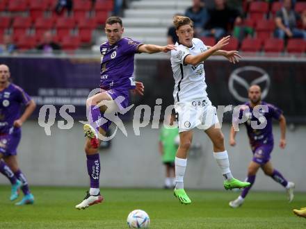Fussball Bundesliga.  SK Austria Klagenfurt gegen SK Puntigamer Sturm Graz.  Andrew Irving,  (Klagenfurt), Alexander Prass   (Graz). Klagenfurt, am 11.9..2022. 
Foto: Kuess

---
pressefotos, pressefotografie, kuess, qs, qspictures, sport, bild, bilder, bilddatenbank
