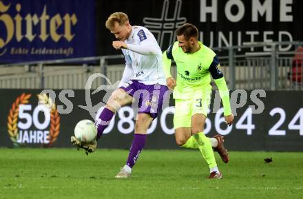 Fussball Woertherseecup. SK Austria Klagenfurt gegen 1860 Muenchen.  Jonas Arweiler,  (Austria Klagenfurt), Niklas Lang (Muenchen). Klagenfurt, 20.11.2022.
Foto: Kuess
---
pressefotos, pressefotografie, kuess, qs, qspictures, sport, bild, bilder, bilddatenbank