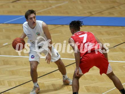 Basketball 2. Liga 2022/2023. Grunddurchgang 7. Runde.  KOS Celovec gegen  Upper Austrian Ballers.  Niklas Michel  (KOS),  Samuel Gatterbauer (Austrian Ballers). Klagenfurt, am 20.11.2022.
Foto: Kuess
www.qspictures.net
---
pressefotos, pressefotografie, kuess, qs, qspictures, sport, bild, bilder, bilddatenbank