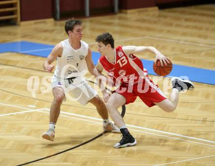 Basketball 2. Liga 2022/2023. Grunddurchgang 7. Runde.  KOS Celovec gegen  Upper Austrian Ballers.   Niklas Michel (KOS),  Simon Hintenaus (Austrian Ballers). Klagenfurt, am 20.11.2022.
Foto: Kuess
www.qspictures.net
---
pressefotos, pressefotografie, kuess, qs, qspictures, sport, bild, bilder, bilddatenbank