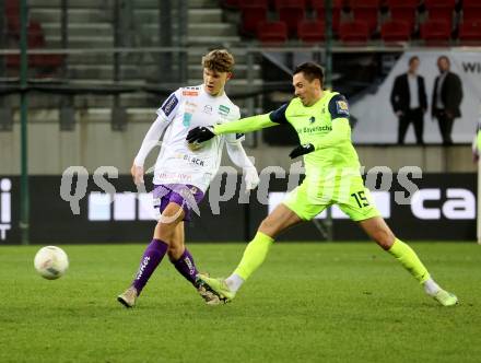 Fussball Woertherseecup. SK Austria Klagenfurt gegen 1860 Muenchen.  Jannik Robatsch (Austria Klagenfurt),  Marcel Baer (1860 Muenchen). Klagenfurt, 20.11.2022.
Foto: Kuess
---
pressefotos, pressefotografie, kuess, qs, qspictures, sport, bild, bilder, bilddatenbank