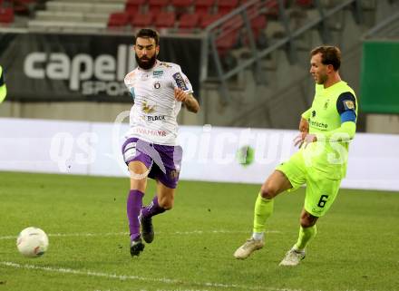 Fussball Woertherseecup. SK Austria Klagenfurt gegen 1860 Muenchen.  KOSMAS GKEZOS (Austria Klagenfurt),  Tim Rieder  (1860 Muenchen). Klagenfurt, 20.11.2022.
Foto: Kuess
---
pressefotos, pressefotografie, kuess, qs, qspictures, sport, bild, bilder, bilddatenbank