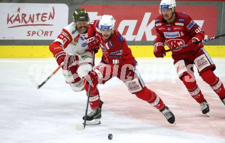 EBEL. Eishockey Bundesliga. EC KAC gegen  HCB Suedtirol Alperia. Lukas Haudum,  (KAC),    Mike Dalhuisen (Bozen). Klagenfurt, am 25.11.2022.
Foto: Kuess
www.qspictures.net
---
pressefotos, pressefotografie, kuess, qs, qspictures, sport, bild, bilder, bilddatenbank