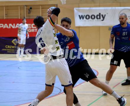 Handball Bundesliga. SC kelag Ferlach gegen ALPLA HC Hard.   Mladan Jovanovic (Ferlach),  Dominik Schmid  (Hard). Ferlach, 2.12.2022.
Foto: Kuess

---
pressefotos, pressefotografie, kuess, qs, qspictures, sport, bild, bilder, bilddatenbank