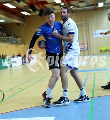 Handball Bundesliga. SC kelag Ferlach gegen ALPLA HC Hard.  Hari Pavlov  (Ferlach),  Dominik Schmid  (Hard). Ferlach, 2.12.2022.
Foto: Kuess

---
pressefotos, pressefotografie, kuess, qs, qspictures, sport, bild, bilder, bilddatenbank