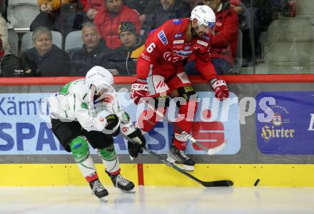 EBEL. Eishockey Bundesliga. EC KAC gegen  HK Olimpija. Lucas Lessio,  (KAC),    Joseph Yasuo Garreffa (Laibach). Klagenfurt, am 4.12.2022.
Foto: Kuess
www.qspictures.net
---
pressefotos, pressefotografie, kuess, qs, qspictures, sport, bild, bilder, bilddatenbank