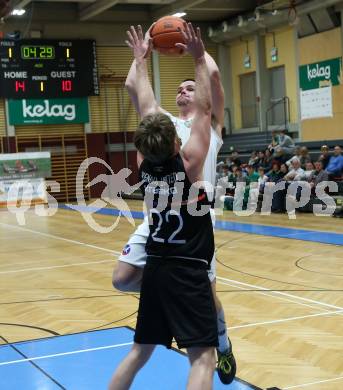 Basketball 2. Liga 2022/2023. Grunddurchgang 11. Runde.  KOS Celovec gegen  Vienna United.   Grega Sajevic (KOS),  Marius Witzmann (Vienna). Klagenfurt, am 17.12.2022.
Foto: Kuess
www.qspictures.net
---
pressefotos, pressefotografie, kuess, qs, qspictures, sport, bild, bilder, bilddatenbank