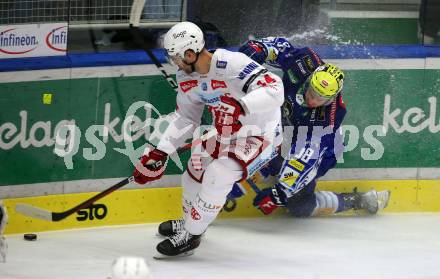 EBEL. Eishockey Bundesliga. VSV gegen KAC.  Blaz Tomazevic,  (VSV),  Paul Postma  (KAC). Villach, am 20.12.2022.
Foto: Kuess
www.qspictures.net
---
pressefotos, pressefotografie, kuess, qs, qspictures, sport, bild, bilder, bilddatenbank