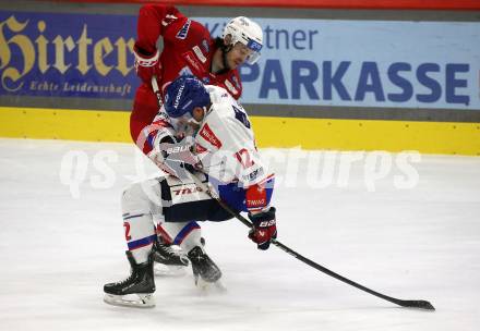 EBEL. Eishockey Bundesliga. EC KAC gegen  HC TIWAG Innsbruck.  Manuel Ganahl,   (KAC),    Braeden Shaw (Innsbruck). Klagenfurt, am 13.1.2023.
Foto: Kuess
www.qspictures.net
---
pressefotos, pressefotografie, kuess, qs, qspictures, sport, bild, bilder, bilddatenbank