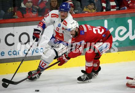 EBEL. Eishockey Bundesliga. EC KAC gegen  HC TIWAG Innsbruck.  Steven Strong, (KAC),    Braeden Shaw  (Innsbruck). Klagenfurt, am 13.1.2023.
Foto: Kuess
www.qspictures.net
---
pressefotos, pressefotografie, kuess, qs, qspictures, sport, bild, bilder, bilddatenbank