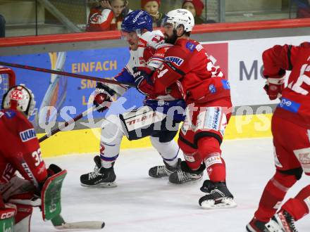 EBEL. Eishockey Bundesliga. EC KAC gegen  HC TIWAG Innsbruck.  Steven Strong,   (KAC),    Braeden Shaw (Innsbruck). Klagenfurt, am 13.1.2023.
Foto: Kuess
www.qspictures.net
---
pressefotos, pressefotografie, kuess, qs, qspictures, sport, bild, bilder, bilddatenbank