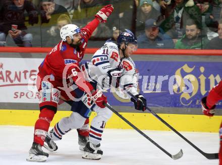 EBEL. Eishockey Bundesliga. EC KAC gegen  Hydro Fehervar AV 19.  Lucas Lessio,  (KAC),    Istvan Bartalis (Fehervar). Klagenfurt, am 17.1.2023.
Foto: Kuess
www.qspictures.net
---
pressefotos, pressefotografie, kuess, qs, qspictures, sport, bild, bilder, bilddatenbank