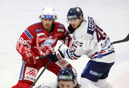 EBEL. Eishockey Bundesliga. EC KAC gegen  Hydro Fehervar AV 19.  Luka Gomboc, (KAC),     Guillaume Leclerc  (Fehervar). Klagenfurt, am 17.1.2023.
Foto: Kuess
www.qspictures.net
---
pressefotos, pressefotografie, kuess, qs, qspictures, sport, bild, bilder, bilddatenbank