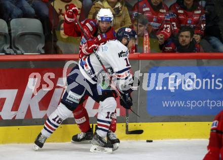 EBEL. Eishockey Bundesliga. EC KAC gegen  Hydro Fehervar AV 19.   Rok Ticar,  (KAC),    Janos Hari  (Fehervar). Klagenfurt, am 17.1.2023.
Foto: Kuess
www.qspictures.net
---
pressefotos, pressefotografie, kuess, qs, qspictures, sport, bild, bilder, bilddatenbank