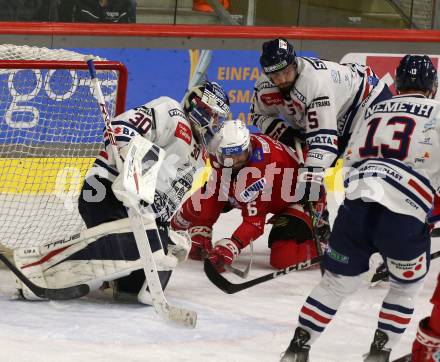 EBEL. Eishockey Bundesliga. EC KAC gegen  Hydro Fehervar AV 19.   Lucas Lessio, (KAC),    Bence Stipsicz, Olivier Roy  (Fehervar). Klagenfurt, am 17.1.2023.
Foto: Kuess
www.qspictures.net
---
pressefotos, pressefotografie, kuess, qs, qspictures, sport, bild, bilder, bilddatenbank