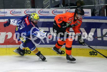 EBEL. Eishockey Bundesliga. EC VSV gegen Graz99ers.   Chris Collins, (VSV),   Michael Kernberger    (Graz). Villach, am 20.1.2023
Foto: Kuess
www.qspictures.net
---
pressefotos, pressefotografie, kuess, qs, qspictures, sport, bild, bilder, bilddatenbank