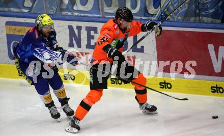 EBEL. Eishockey Bundesliga. EC VSV gegen Graz99ers.   Simon Despres, (VSV), Tobias Fladeby     (Graz). Villach, am 20.1.2023
Foto: Kuess
www.qspictures.net
---
pressefotos, pressefotografie, kuess, qs, qspictures, sport, bild, bilder, bilddatenbank